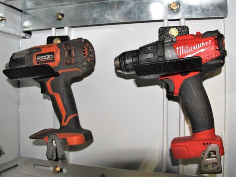 service truck tool storage ideas: Drill holders for compartment interior - gallery