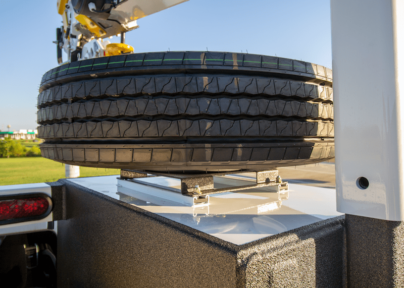 spare tire retainer for side paack or cargo area - gallery