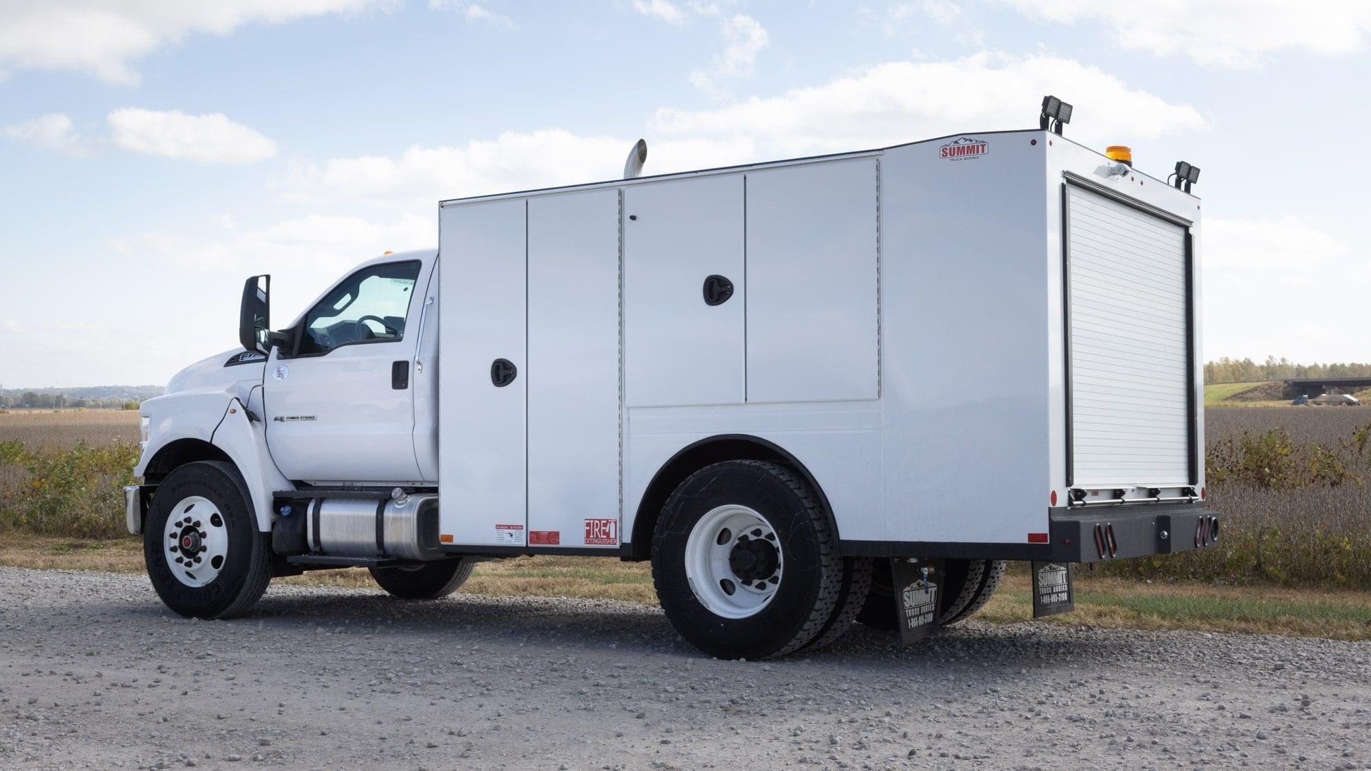 The Open lube body's rear reel compartemnt has roll up door access.