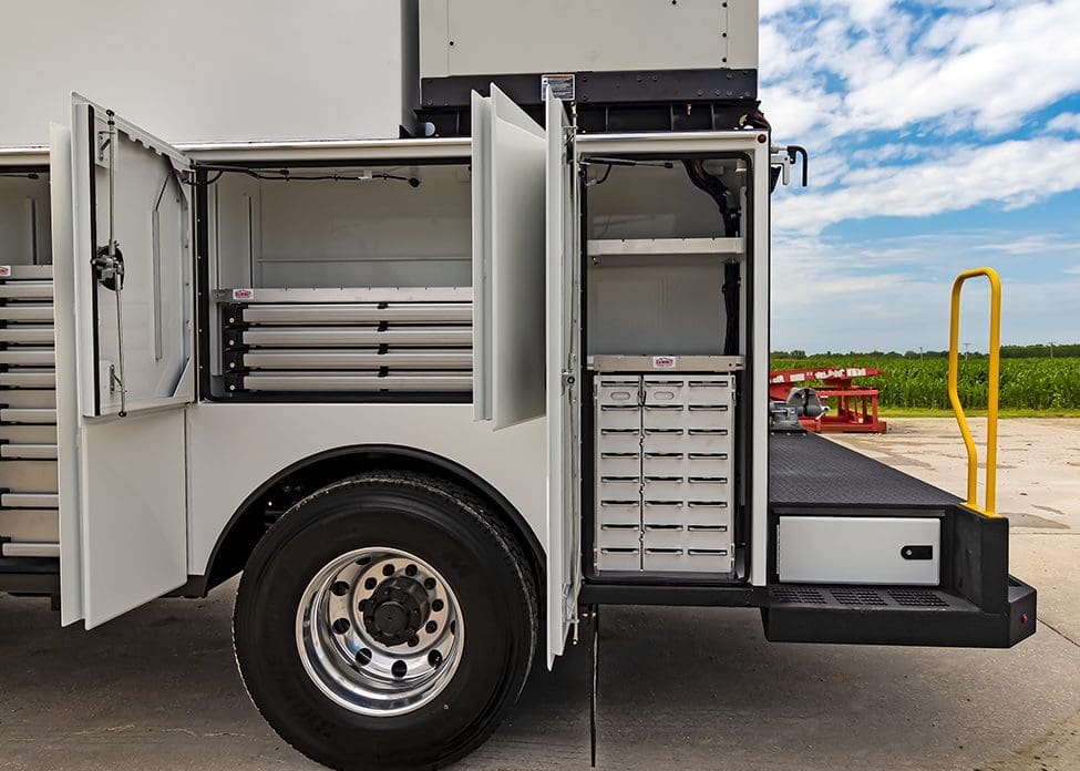 shelves and bolt bin inside Summit canopy truck body