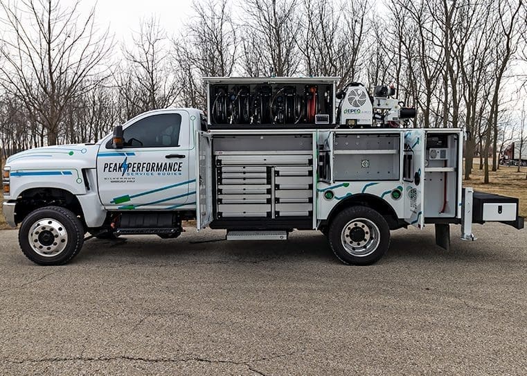 truck body with drawer pack and reel storage