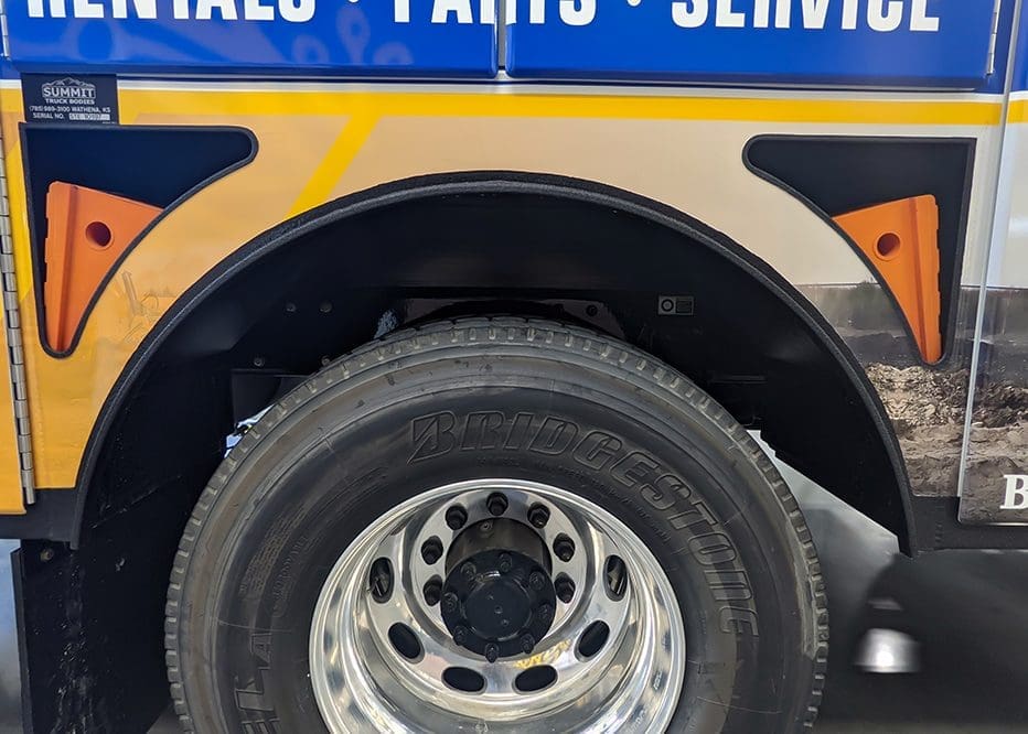 service truck tool storage ideas: wheel chock & wheel well storage